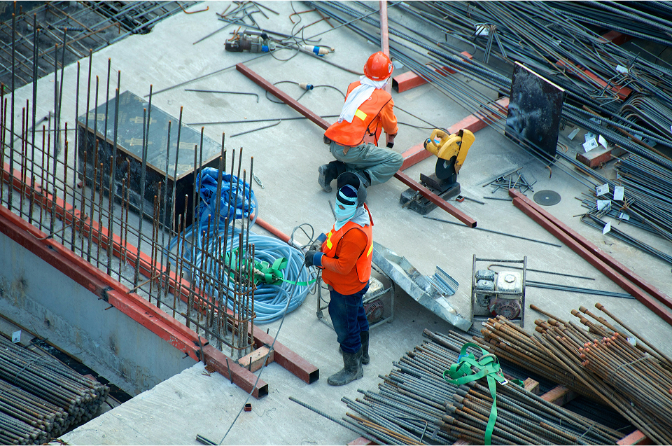injured construction worker receiving medical treatment