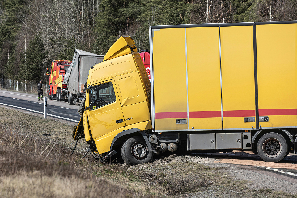 truck accident scene with damaged commercial vehicle